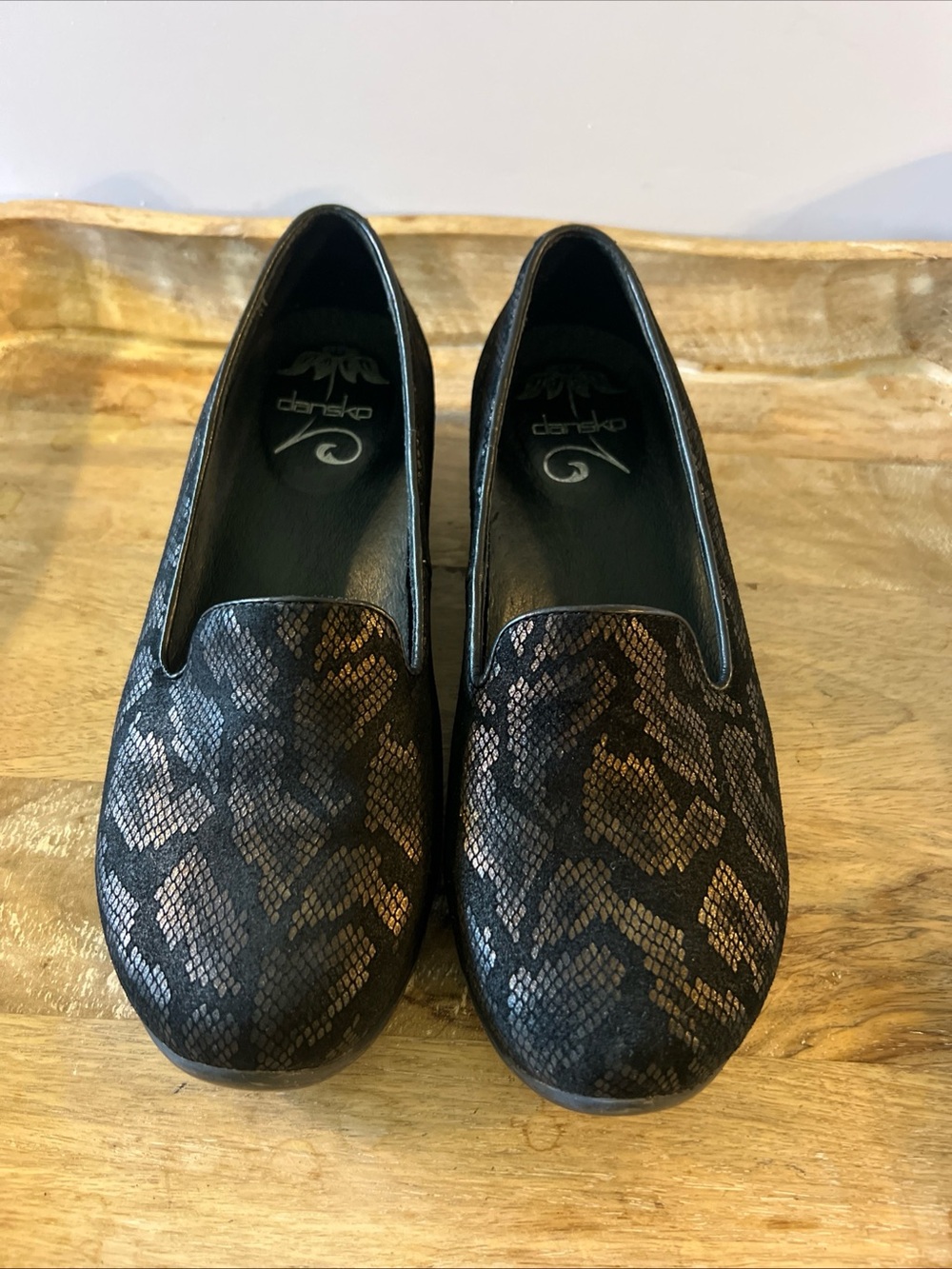 Dansko Black and Brown Snake-Print Slip-On Loafers